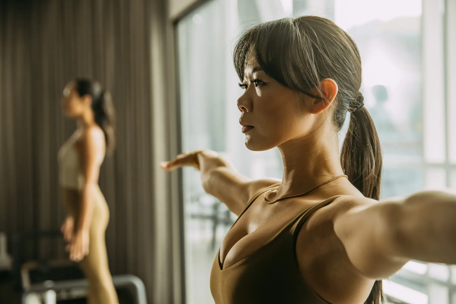 Person with arms wide a part