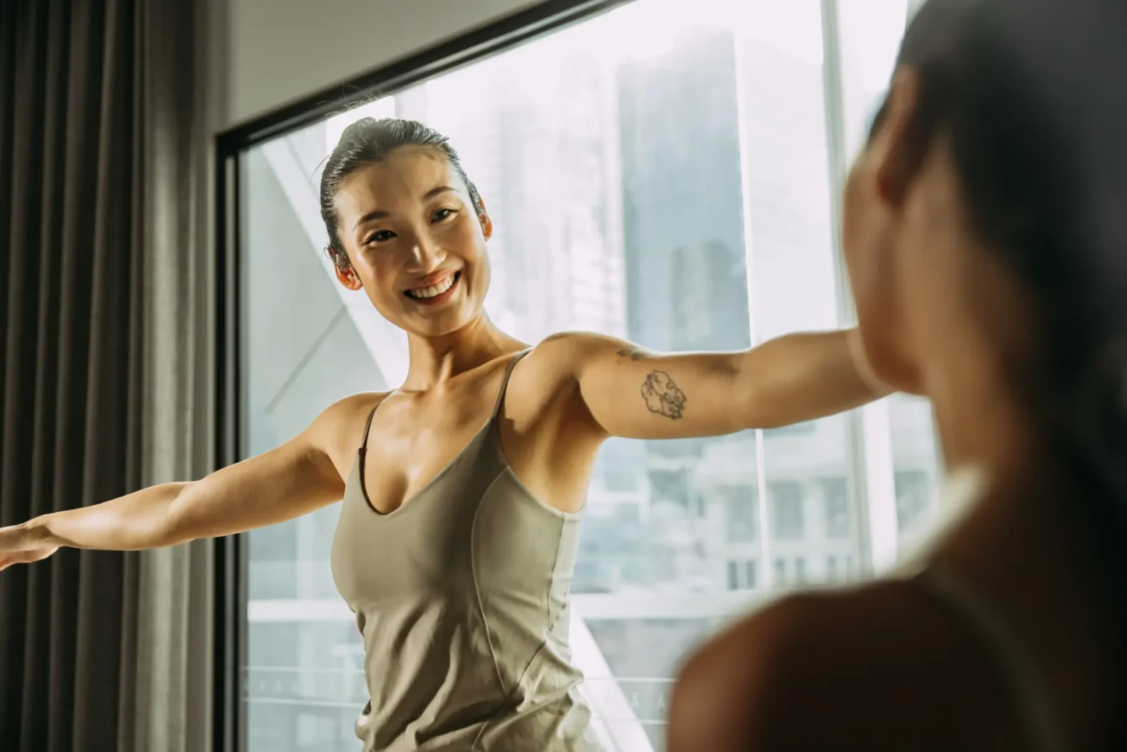 Person with arms wide a part