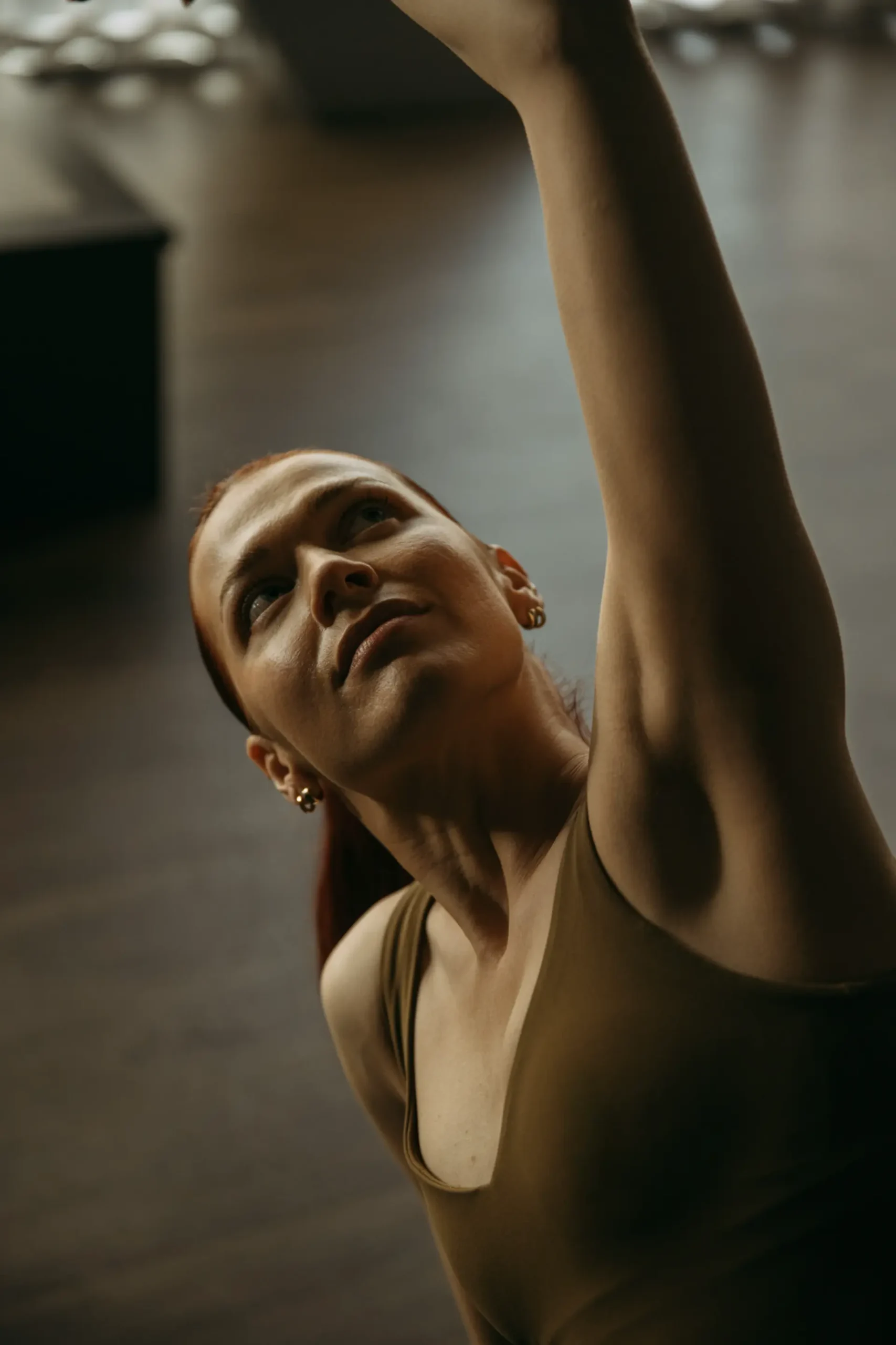 Person looking up in yoga pose