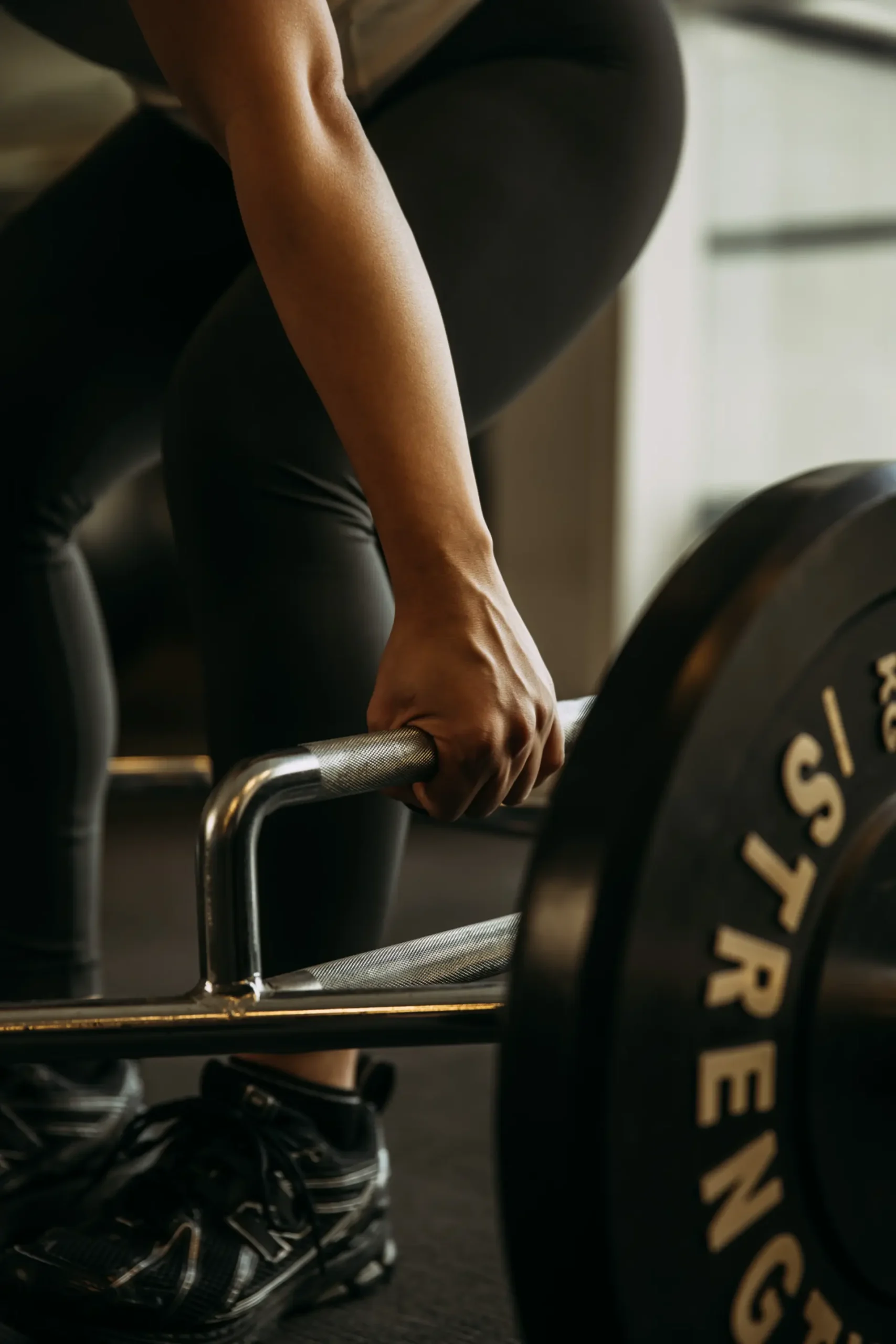 Close up of arm on weights
