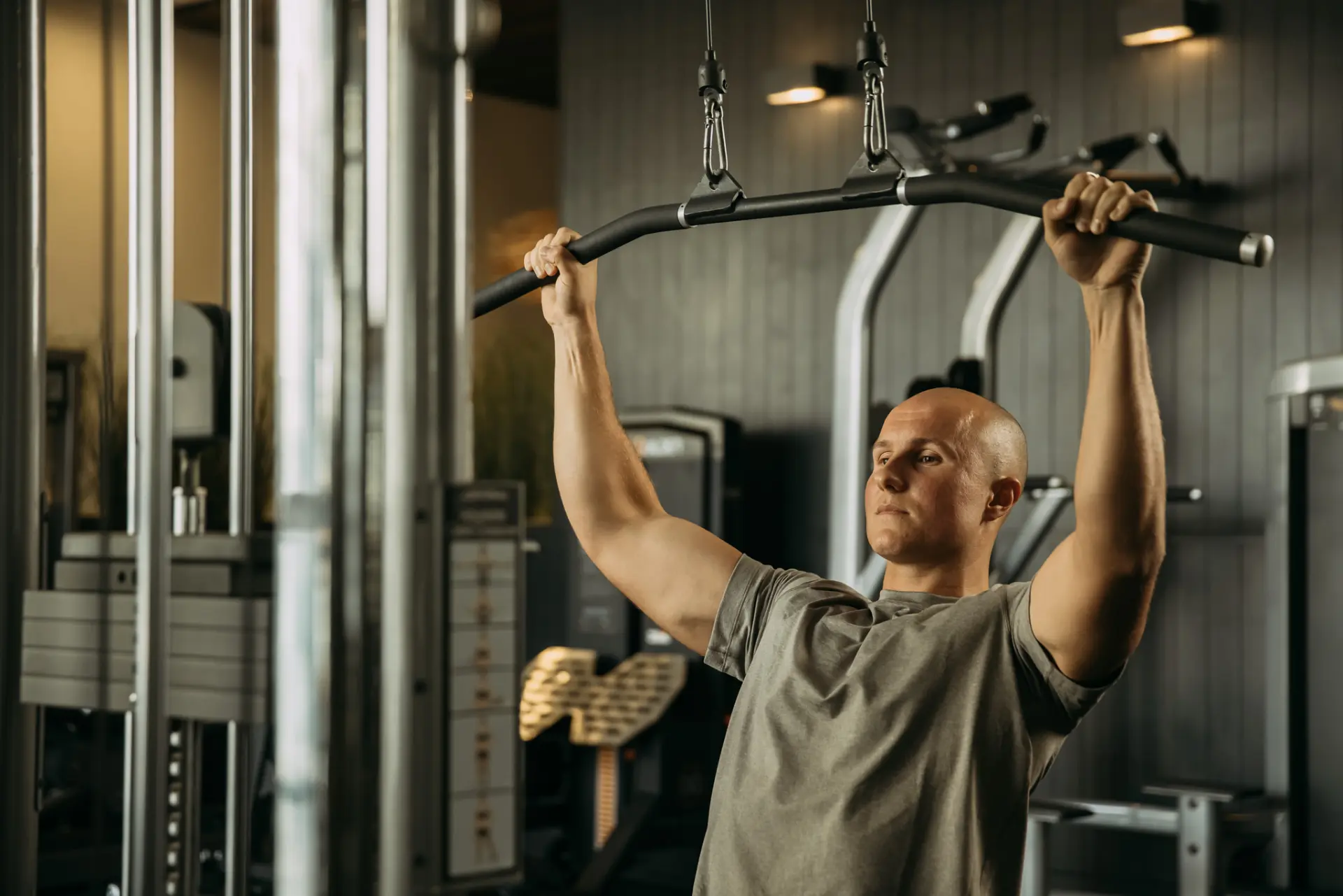 Person using pulldown machine