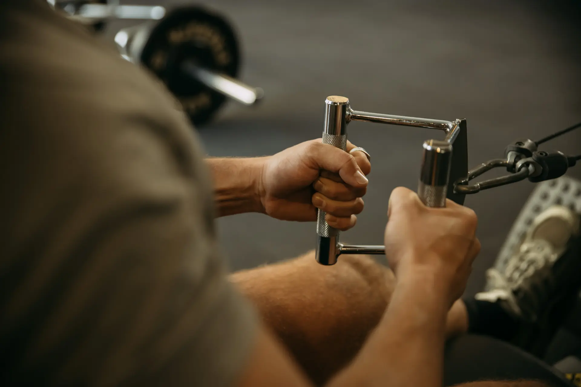 Close up of person pulling metal handle