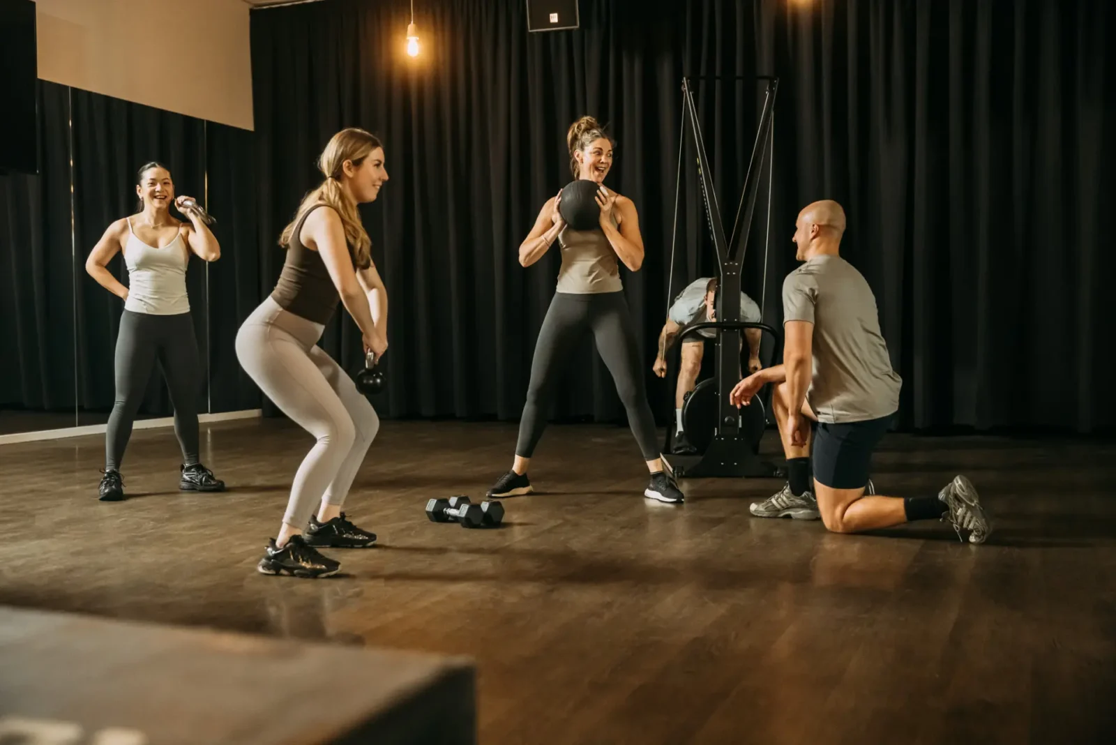 Group of people exercising with weights
